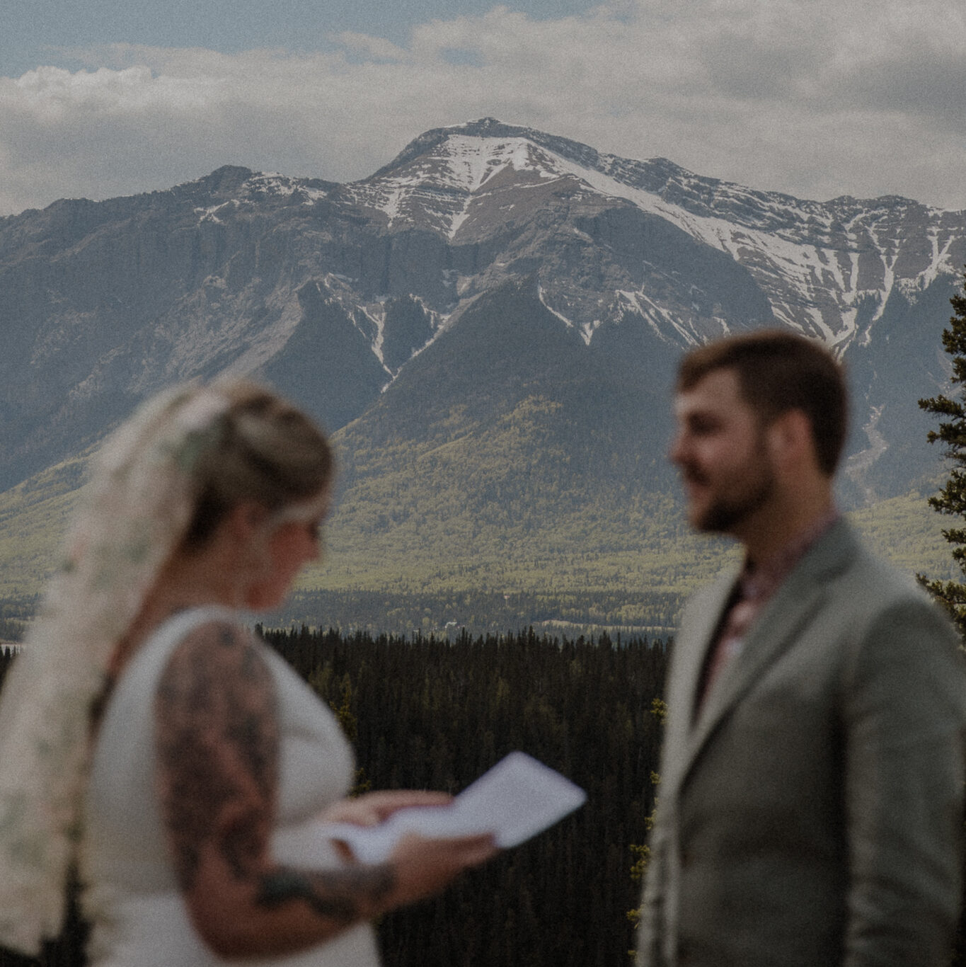 Wedding Couple Sharing Vows in The Mountains